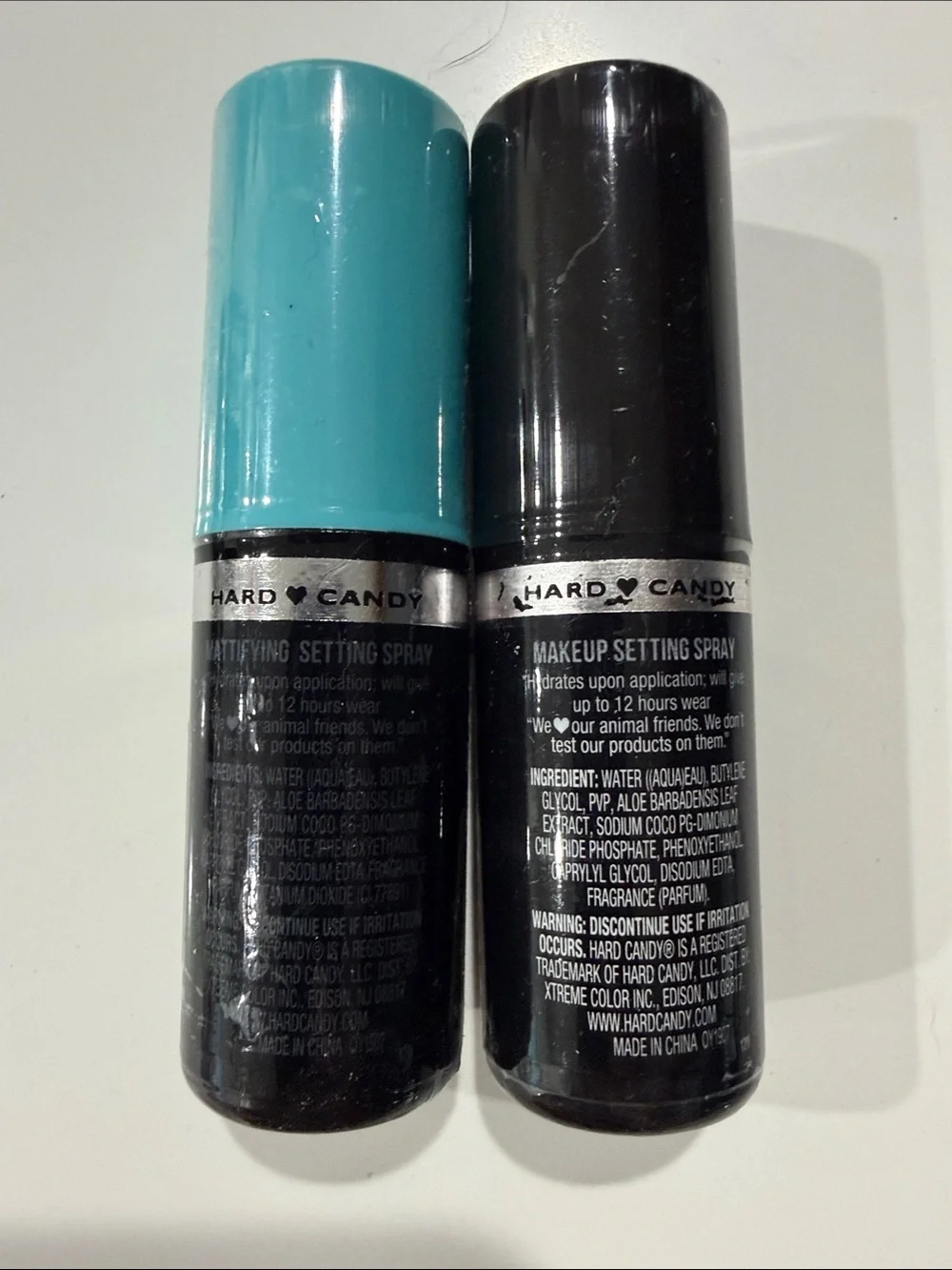 Hard Candy Setting Spray Duo — Teal & Black Caps